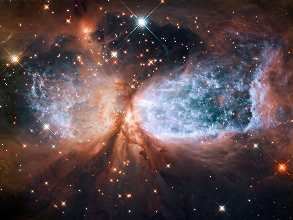 Região compacta de formação estelar Sh 2-106